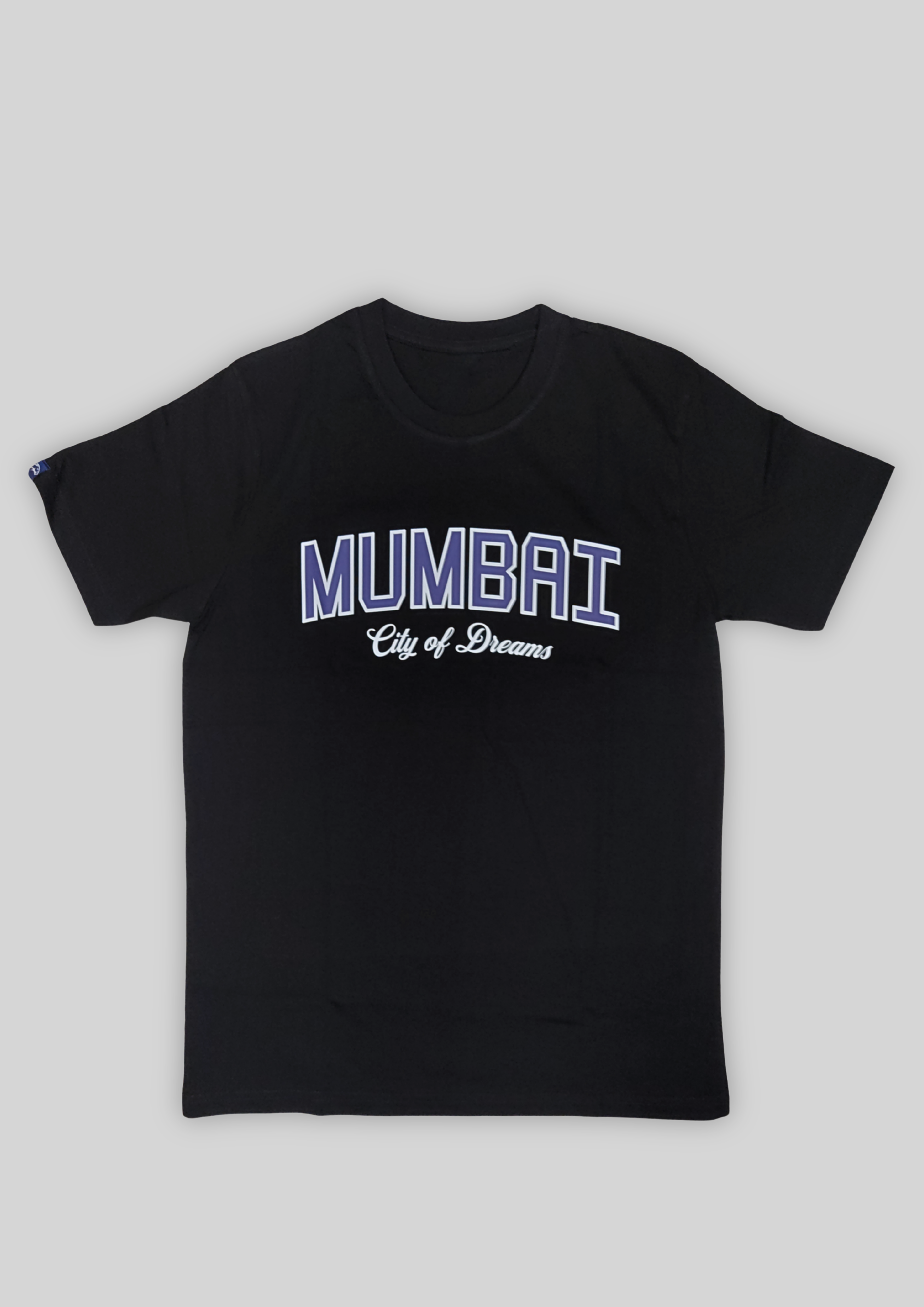 Black t-shirt with 'Mumbai City of Dreams' text on a light gray background